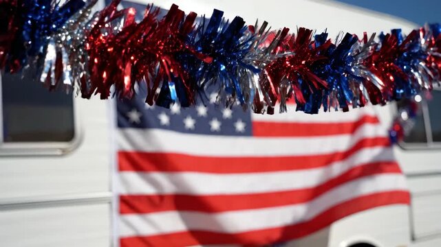 American flag and patriotic garland decorating RV for holiday