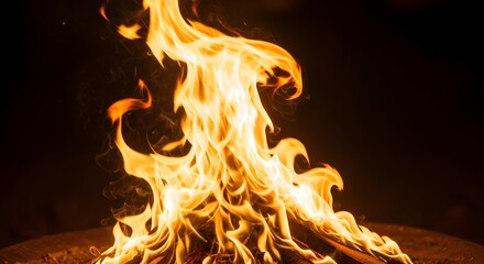 Fototapeta premium Intense flames rising a dramatic close up of a roaring fire at night