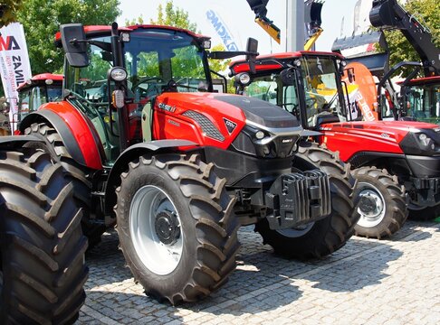 Red Case IH tractors at outdoor agricultural exhibition