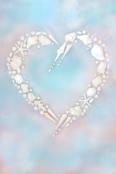 Pearl and sea shell heart shape wreath on blue pink sky background, romantic decorative art symbol of love for Valentines, wedding, birthday or anniversary