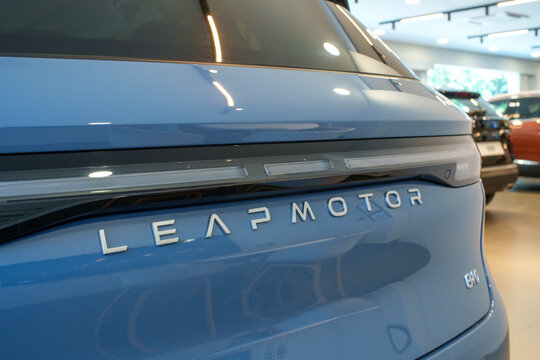 Penang, Malaysia - Apr 07, 2026: A close-up view of the rear of a blue Leapmotor B10 electric SUV, showing the Leapmotor brand lettering and B10 model emblem on the tailgate inside a car showroom.