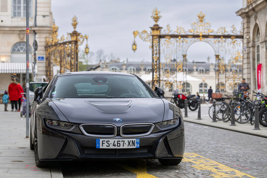 Nancy, France - April 6th 2022 : View on a dark grey BMW i8 parked on a street. The BMW i8 is a plug-in hybrid sports car developed by BMW.