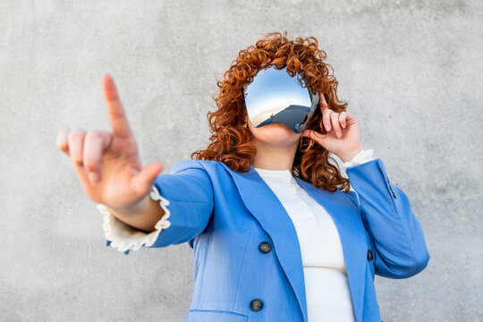 Entrepreneur interacting with virtual reality outdoors