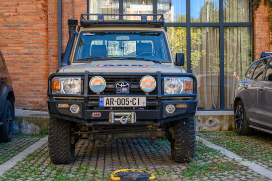 Tbilisi, Georgia, 10.29.2025 Toyota Off-Road Jeep on Parking Near House