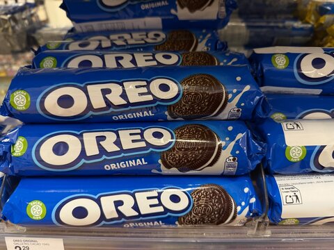 Palma, spain, may 2, 2026, oreo original cookies displaying branding on blue packaging stacked on a supermarket shelf