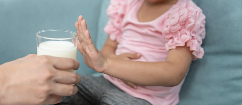 Milk allergens, children confused milk, runny stuffy sore nose suffer from intolerance allergy trigger symptoms. abdominal pain, allergens, nut protein, rash, death, food allergy