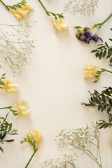 Obraz premium Floral Flat Lay with Freesia and Baby's Breath
