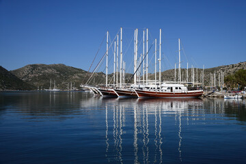 Gulets moored in Bozburun marina, Turkey. Bozburun is also well known in  region for its expert construction gulets, traditional design of  two-masted or three-masted wooden sailing vessel © Oleg Znamenskiy