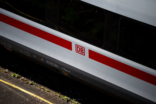 DB Deutsche Bahn logo sign on a train. German national railway company logotype, provider of rail transport and infrastructure in Germany on April 21, 2026 in Berlin, Germany.