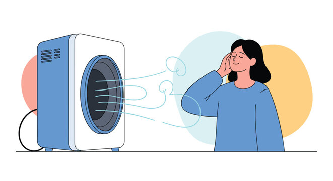 Young woman feeling refreshed by the cool air from a portable air cooler unit representing comfort during hot summer days.