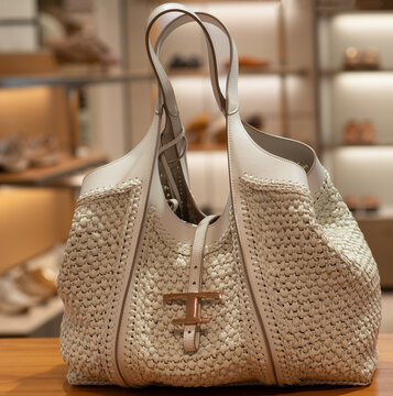 Tod's Timeless Shopping Bag in white raffia with a crochet effect and leather. Milan, Italy, 15 April 2026