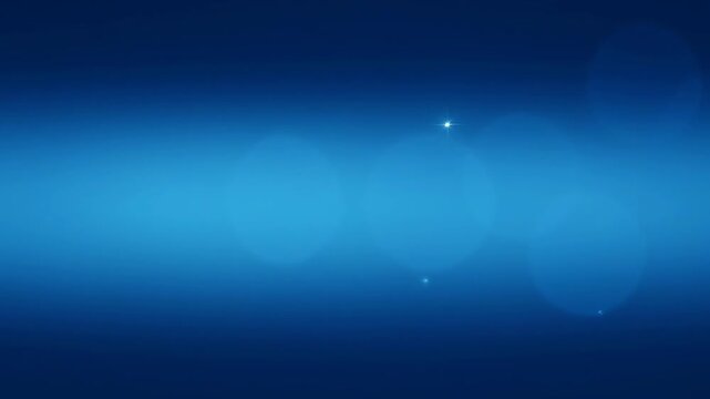Abstract Blue Bokeh Lights Overlay Motion Background with Glowing Particles and Lens Flare Effect