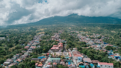 Aerial Panorama of Majayjay Town in Laguna, Provincial Philippine Cityscape with Mount Banahaw Foothills and Rural Residential Houses, High Angle Tropical Landscape View © Gids Stories