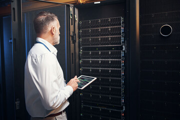 Man, tablet screen and rack inspection in server room for system health, hardware audit or backup....
