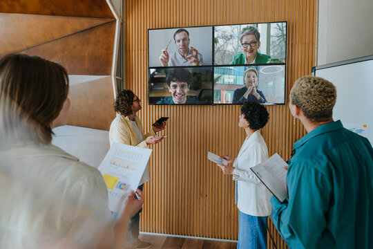 Business team having a video call meeting in a modern office