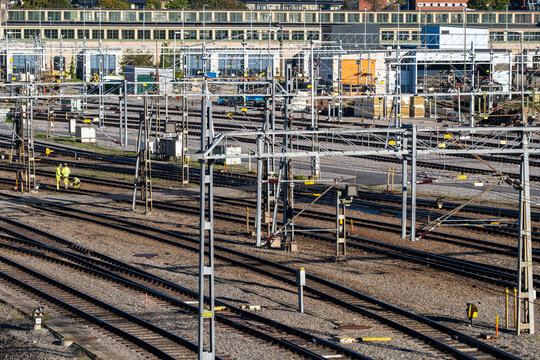 Complex railway tracks network in Stockholm Sweden with infrastructure signals and lines in daylight showcasing modern transport system and logistics