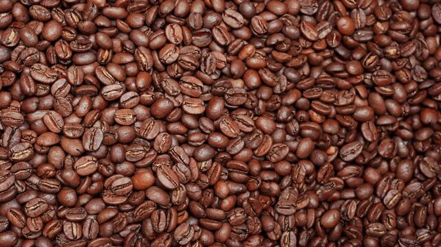 Rotating Top Down View of Premium Medium Roasted Coffee Beans Texture