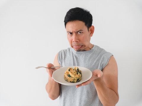 Skeptical evaluator in studio ready to critique cuisine truthfully