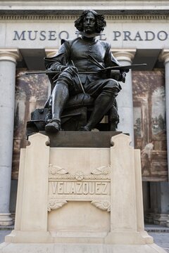 Madrid, Spain; April 28, 2026: Statue of the Spanish Baroque painter Diego Velazquez in a public art monument in front of the main entrance of the Prado Museum in Madrid
