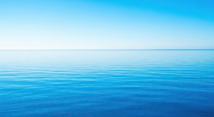 Obraz premium A peaceful view of the vast blue sea meeting a cloudless bright sky at the distant horizon, capturing a calm and tranquil marine atmosphere, gentle, water, morning