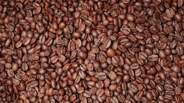 Rotating Top Down View of Premium Medium Roasted Coffee Beans Texture