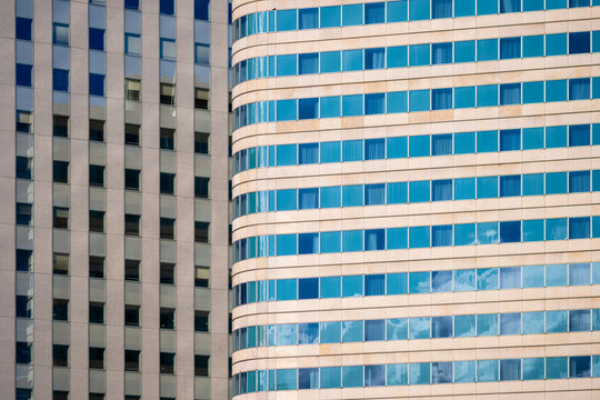 Within paris la defense an architecture office facade transforms windows and grid into pattern and abstract geometry with clean corporate order