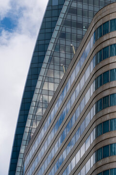 At the heart of paris la defense this architecture skyscraper office blends glass curves pattern and abstract geometry into a refined business statement