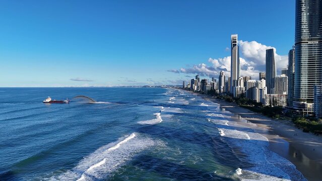 Aerial View of Sand Dredging Ship Near Gold Coast City Skyline