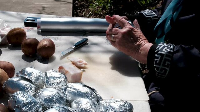 to wrap potatoes in foil to roast on campfire.