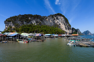 View from Phang Nga Bay of Ko Panyi, also known as Koh Panyee, a Muslim, floating, fishing village in Phang Nga Province, Thailand, notable for being built on stilts by Bugis fishermen. © Yehoshua Halevi