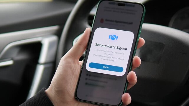 Closing a business deal on the go. User signs a contract electronically via mobile app inside a vehicle. Secure digital signature process with successful execution alert. Perfect for corporate and