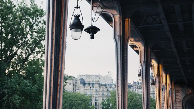 Riding the metro over the bir-hakeim bridge in paris