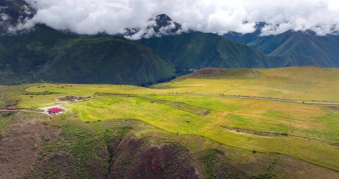 Hilly landscape with dramatic scenery of Sacred Valley in Maras district. Aerial