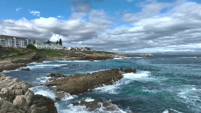 Drone flight over the seaside cliffs in Hermanus in South Africa.