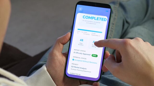 High-impact shot of a completed freelance task on a smartphone. Features a clean UI with Project Status: Completed and official approval. Ideal for recruitment ads, remote work lifestyle, and fintech
