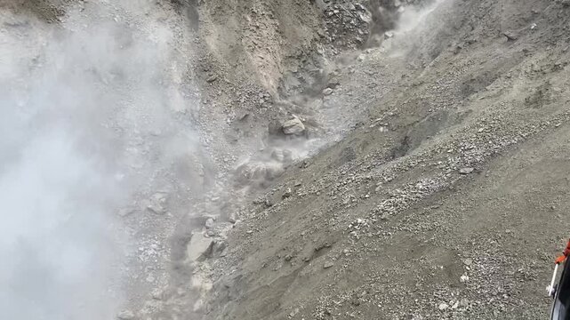 Helicopter view of a landslide in Nepal, showing natural disaster impact, terrain movement, and mountainous landscape conditions.