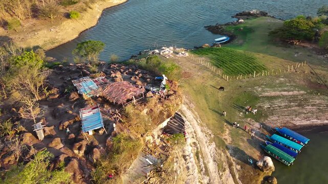Plane wreckage on island. 
Aerial drone view of the islands on Lago Suchitlan in El Salvador. The Cerr&oacute;n Grande Reservoir, also known locally as Lake Suchitl&aacute;n