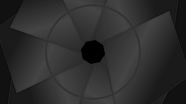 Abstract animated motion graphics clip with a dark gray, geometric aperture-like opening. The circular design features overlapping panels that appear to expand or contract.