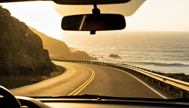 Curving coastal highway following cliff, showing double yellow lines, dash, mirror, guardrail
