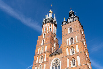 Fototapeta premium Kosciol Mariacki, Bazylika Mariacka, (The St Mary Church, Saint Mary's Basilica) at the Main Market Square in Krakow, Krakow Old City, Krakow, Cracow, Poland