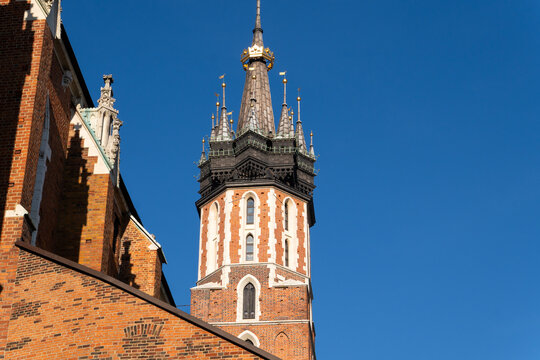 Spires of the Kosciol Mariacki, Bazylika Mariacka, (The St Mary Church, Saint Mary's Basilica) at the Main Market Square in Krakow, Krakow Old City, Krakow, Cracow, Poland