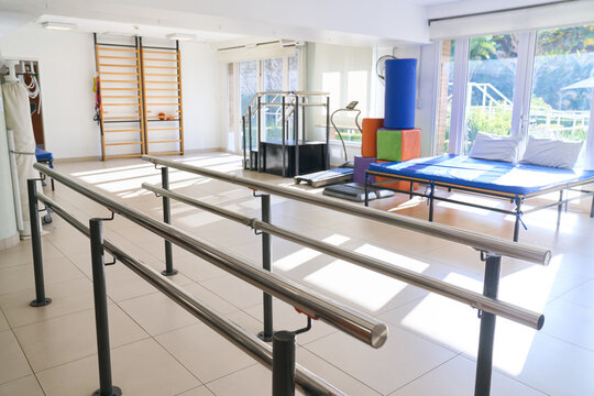Rehabilitation Center Interior With Parallel Bars Ladder And Equipment For Physiotherapy And Recovery Indoor Setting For Medical