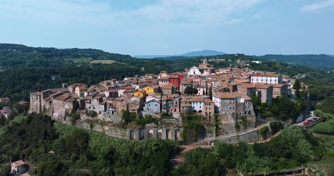 Orte Italy historic town aerial perspective summer day. Unique stone architecture on tuff plateau scenic landscape travel tourism exploration destination.
