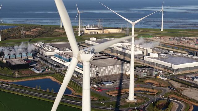 Aerial view of wind turbine powering a data center