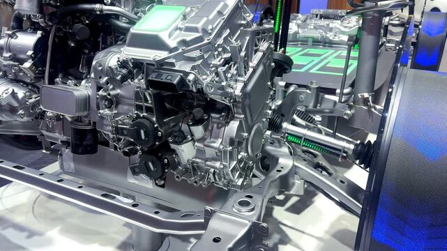 High-tech automotive engineering: Electric car drivetrain and suspension system assembly on white background.