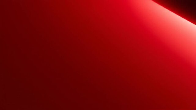 Red abstract background with light beam.
