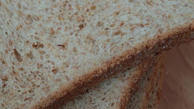 Whole wheat bread on wooden 