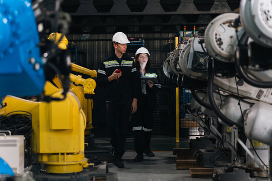 Welding robotic industrial automation engineer factory technology manufacturing steel machinery precision production innovation system technician equipment control modern process