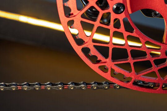  Red Anodized Bicycle Chainring Macro Close-Up With Chain
