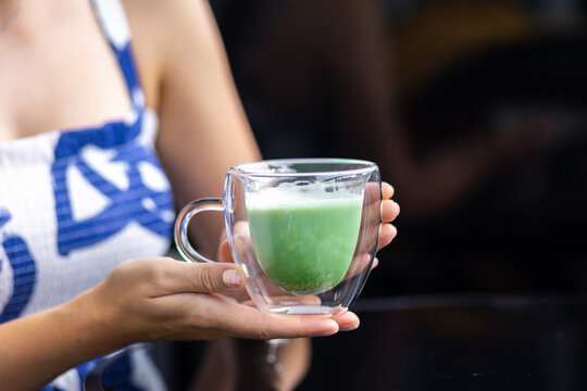 Refreshing Green Matcha Tea In Transparent Glass Cup